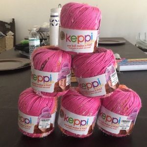 Six skeins Keppi. sparkle.  Crochet pattern inside